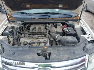 2009 Ford Taurus Limited z VIN 1FAHP25W79G104342, wystawiony jako IAAI lot #42140990 z przebiegiem 130 214 mil mil oraz . Historia ofert i sprzedaży dostępna na DreamBid. Obrazek 10.