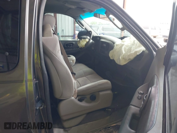 2002 Ford F-150 XL with VIN 1FTRX17242NB82159, listed as a IAAI auction lot 42283839 with 163,685 mi miles and . Bid and sale history available at DreamBid. Image 5.