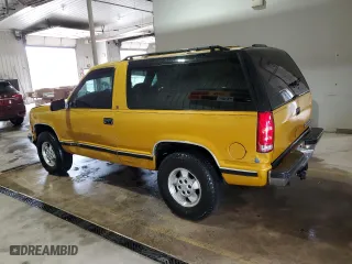 1997 Chevrolet Tahoe with VIN 3GNEK18R1VG104628, listed as a Copart auction lot 53315215 with 195,743 mi miles and Salvage Title. Bid and sale history available at carsss.com. Image 2.