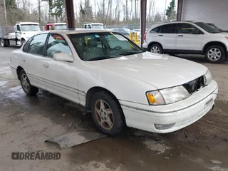 1998 Toyota Avalon XL with VIN 4T1BF18B5WU242038, listed as a IAAI auction lot 41577342 with 195,707 mi miles and . Bid and sale history available at DreamBid. Image 1.