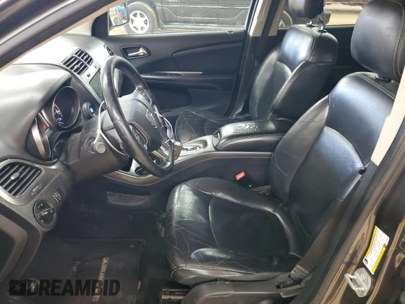 2014 Dodge Journey Crossroad with VIN 3C4PDCGG8ET284320, listed as a Copart auction lot 46924985 with 192,321 mi miles and Salvage title. Bid and sale history available at DreamBid. Image 7.
