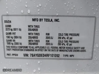 2024 Tesla Model Y with VIN 7SAYGDED4RF101092, listed as a IAAI auction lot 41053542 with 7,108 mi miles. Bid and sale history available at carsss.com. Image 9.