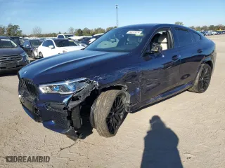 2022 BMW X6 M50i with VIN 5UXCY8C02N9J97545, listed as a Copart auction lot 83272824 with 0 mi miles and Salvage Title. Bid and sale history available at carsss.com. Image 1.