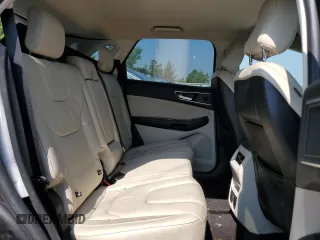 2020 Ford Edge Titanium с VIN 2FMPK4K99LBB03007, выставлен на аукционе Copart как лот 60809735 с пробегом 40 127 миль миль и Списание • Salvage title. История ставок и продаж доступна на DreamBid. Изображение 11.