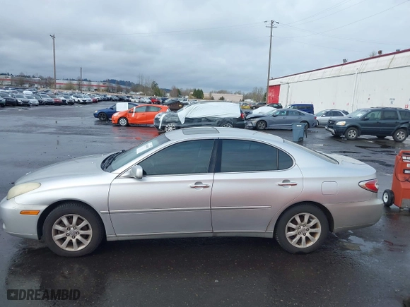 2003 Lexus ES 300 with VIN JTHBF30G830130603, listed as a IAAI auction lot 41849482 with 212,667 mi miles. Bid and sale history available at carsss.com. Image 14.