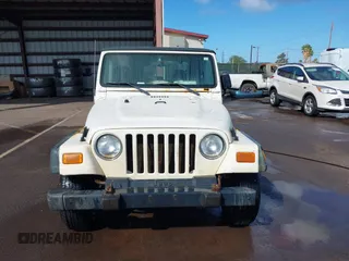 2004 Jeep Wrangler X z VIN 1J4FA39S04P747828, wystawiony jako IAAI lot #41484240 z przebiegiem Nie podano mil oraz . Historia ofert i sprzedaży dostępna na DreamBid. Obrazek 13.