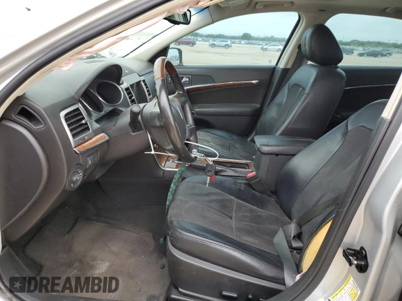 2011 Lincoln MKZ с VIN 3LNHL2GC7BR764304, выставлен на аукционе Copart как лот 55140005 с пробегом 128 062 миль миль и Списание • Salvage title. История ставок и продаж доступна на DreamBid. Изображение 7.