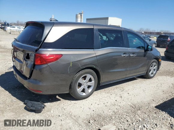 2018 Honda Odyssey EX-L with VIN 5FNRL6H78JB069850, listed as a Copart auction lot 49771875 with 103,914 mi miles and Salvage Title. Bid and sale history available at DreamBid. Image 3.