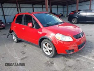 2009 Suzuki SX4 Man AWD with VIN JS2YB413496202028, listed as a IAAI auction lot 41930233 with 169,063 mi miles. Bid and sale history available at carsss.com. Image 1.