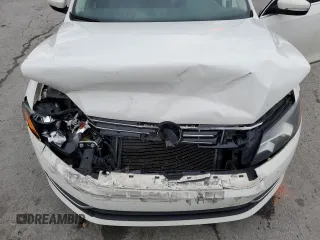 2013 Volkswagen Passat SEL Premium z VIN 1VWCN7A32DC012314, wystawiony jako Copart lot #58093405 z przebiegiem Nie podano mil oraz Szkoda całkowita • Salvage title. Historia ofert i sprzedaży dostępna na DreamBid. Obrazek 11.