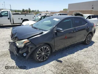 2014 Toyota Corolla L with VIN 5YFBURHE1EP079516, listed as a Copart auction lot 63801805 with 140,532 mi miles and Salvage title. Bid and sale history available at DreamBid. Image 1.