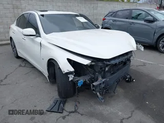 2015 Infiniti Q50 Premium with VIN JN1BV7AP1FM348389, listed as a IAAI auction lot 41754694 with 60,618 mi miles and . Bid and sale history available at DreamBid. Image 1.