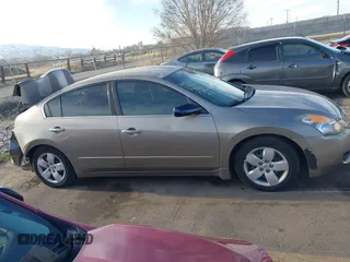 2007 Nissan Altima 2.5 S with VIN 1N4AL21E07C129405, listed as a IAAI auction lot 41883830 with 169,938 mi miles. Bid and sale history available at carsss.com. Image 14.