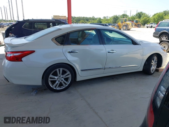 2016 Nissan Altima SL z VIN 1N4BL3AP0GC164425, wystawiony jako IAAI lot #42175694 z przebiegiem 106 255 mil mil oraz . Historia ofert i sprzedaży dostępna na DreamBid. Obrazek 13.