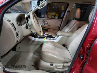 2005 Mercury Mariner Luxury z VIN 4M2YU57115DJ31385, wystawiony jako Copart lot #82533724 z przebiegiem 184 825 mil mil oraz Tytuł czysty. Historia ofert i sprzedaży dostępna na DreamBid. Obrazek 7.