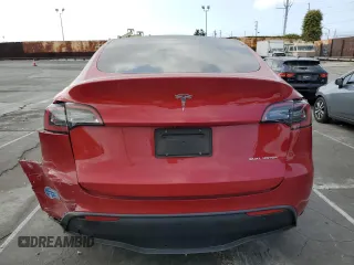2021 Tesla Model Y Long Range with VIN 5YJYGDEEXMF217816, listed as a Copart auction lot 51008665 with 57,392 mi miles and Salvage Title. Bid and sale history available at DreamBid. Image 6.