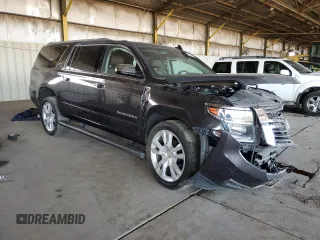 2017 Chevrolet Suburban Premier with VIN 1GNSCJKC8HR163863, listed as a Copart auction lot 78903514 with 142,212 mi miles and Salvage title. Bid and sale history available at DreamBid. Image 4.