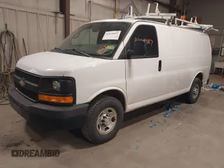 2015 Chevrolet Express Cargo Van with VIN 1GCWGFCF9F1167677, listed as a IAAI auction lot 42018087 with 148,263 mi miles. Bid and sale history available at carsss.com. Image 17.