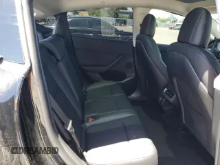 2022 Tesla Model Y Performance z VIN 7SAYGDEF2NF573979, wystawiony jako Copart lot #57778265 z przebiegiem 49 232 mil mil oraz Szkoda całkowita • Salvage title. Historia ofert i sprzedaży dostępna na DreamBid. Obrazek 11.