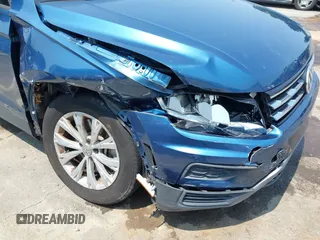 2019 Volkswagen Tiguan S с VIN 3VV1B7AX0KM122040, выставлен на аукционе IAAI как лот 42389559 с пробегом 53 122 миль миль и . История ставок и продаж доступна на DreamBid. Изображение 6.