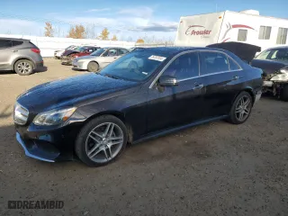2015 Mercedes-Benz E-Class E 400 with VIN WDDHF6HB4FB155129, listed as a Copart auction lot 76707334 with 101,111 mi miles and Salvage Title. Bid and sale history available at carsss.com. Image 1.