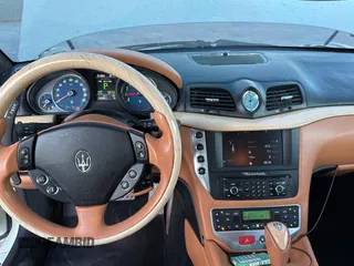 2012 Maserati GranTurismo S with VIN ZAM45KLA1C0061862, listed as a Copart auction lot 87091844 with 31,825 mi miles and Clean Title. Bid and sale history available at carsss.com. Image 9.