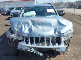 2013 Jeep Compass Latitude with VIN 1C4NJDEB2DD263920, listed as a IAAI auction lot 41832542 with 128,018 mi miles. Bid and sale history available at carsss.com. Image 6.