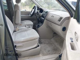 2004 Kia Sedona LX with VIN KNDUP131346533373, listed as a IAAI auction lot 41632342 with 76,545 mi miles. Bid and sale history available at carsss.com. Image 5.