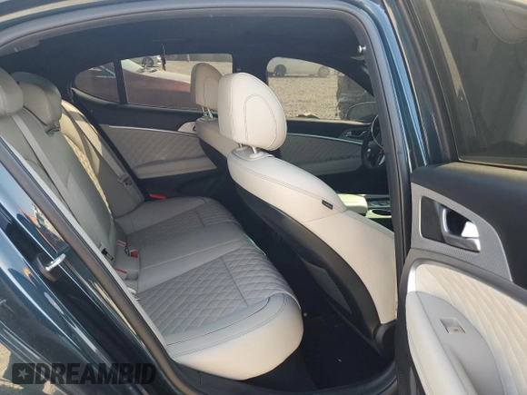 2022 Genesis G70 3.3T with VIN KMTG54TE5NU097499, listed as a Copart auction lot 75570294 with 64,864 mi miles and Salvage Title. Bid and sale history available at DreamBid. Image 10.