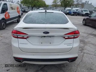 2017 Ford Fusion Titanium with VIN 3FA6P0K99HR272713, listed as a IAAI auction lot 41757334 with 104,733 mi miles. Bid and sale history available at carsss.com. Image 16.