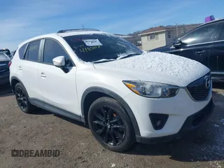 2015 Mazda CX-5 Grand Touring with VIN JM3KE2DY9F0541215, listed as a IAAI auction lot 41854111 with 67,249 mi miles. Bid and sale history available at carsss.com. Image 1.