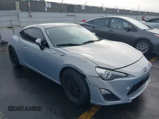 2013 Scion FR-S with VIN JF1ZNAA1XD1729862, listed as a IAAI auction lot 41143862 with 64,208 mi miles. Bid and sale history available at carsss.com. Image 1.