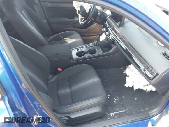 2023 Honda Civic Sport with VIN 2HGFE2F52PH508391, listed as a IAAI auction lot 41907096 with 19,485 mi miles and . Bid and sale history available at DreamBid. Image 5.