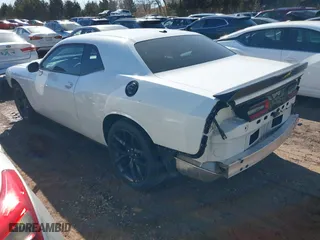 2021 Dodge Challenger SXT with VIN 2C3CDZAG1MH560522, listed as a IAAI auction lot 41709759 with 32,384 mi miles. Bid and sale history available at carsss.com. Image 3.