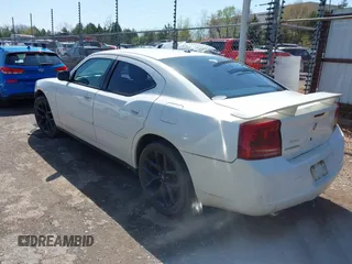 2007 Dodge Charger with VIN 2B3KA43GX7H838257, listed as a IAAI auction lot 41963059 with 215,876 mi miles. Bid and sale history available at carsss.com. Image 3.