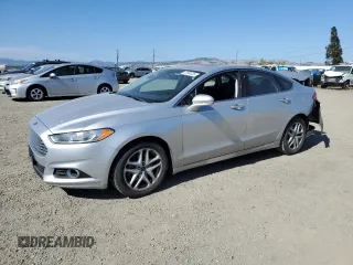 2015 Ford Fusion SE with VIN 3FA6P0HD8FR137683, listed as a Copart auction lot 57684495 with 115,282 mi miles and Salvage title. Bid and sale history available at DreamBid. Image 1.