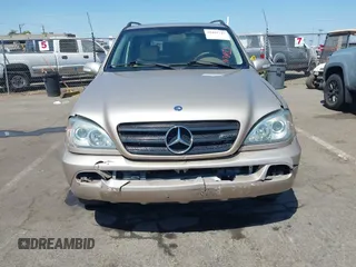 2004 Mercedes-Benz M 350 with VIN 4JGAB57E14A512245, listed as a IAAI auction lot 42452747 with 198,021 mi miles and . Bid and sale history available at DreamBid. Image 6.