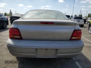 1997 Dodge Stratus z VIN 1B3EJ56H0VN679440, wystawiony jako Copart lot #71977454 z przebiegiem 83 367 mil mil oraz Tytuł czysty. Historia ofert i sprzedaży dostępna na DreamBid. Obrazek 6.
