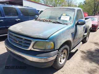 2000 Ford F-150 XL with VIN 1FTZF0722YKB38958, listed as a IAAI auction lot 42050827 with 235,315 mi miles. Bid and sale history available at carsss.com. Image 2.