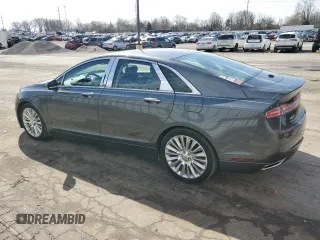 2015 Lincoln MKZ z VIN 3LN6L2JKXFR600669, wystawiony jako Copart lot #51130115 z przebiegiem 75 176 mil mil oraz Szkoda całkowita • Salvage title. Historia ofert i sprzedaży dostępna na DreamBid. Obrazek 2.