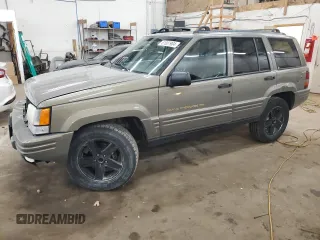 1996 Jeep Grand Cherokee Limited with VIN 1J4GZ78S5TC210710, listed as a Copart auction lot 81307904 with 285,169 mi miles and Salvage Title. Bid and sale history available at carsss.com. Image 1.