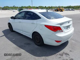 2014 Hyundai Accent GLS with VIN KMHCT4AE1EU590386, listed as a IAAI auction lot 42155202 with 248,545 mi miles. Bid and sale history available at carsss.com. Image 3.