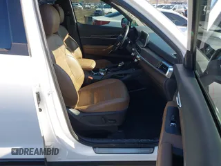 2022 Kia Telluride SX z VIN 5XYP5DHC2NG299501, wystawiony jako IAAI lot #41816830 z przebiegiem 61 413 mil mil oraz . Historia ofert i sprzedaży dostępna na DreamBid. Obrazek 5.