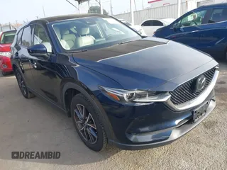 2018 Mazda CX-5 Grand Touring with VIN JM3KFBDM5J1473461, listed as a IAAI auction lot 41200192 with 41,798 mi miles and . Bid and sale history available at DreamBid. Image 1.