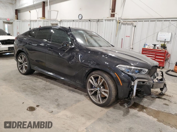 2021 BMW X6 M50i with VIN 5UXCY8C05M9E21862, listed as a Copart auction lot 86329064 with 0 mi miles and Salvage Title. Bid and sale history available at carsss.com. Image 4.