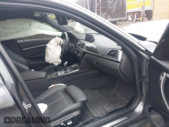 2018 BMW 3 Series with VIN WBA8F1C54JAE93207, listed as a IAAI auction lot 41876781 with 64,749 mi miles and . Bid and sale history available at DreamBid. Image 5.