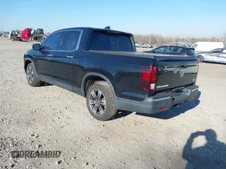 2019 Honda Ridgeline RTL-E with VIN 5FPYK3F7XKB033652, listed as a IAAI auction lot 41751421 with 96,774 mi miles and . Bid and sale history available at DreamBid. Image 3.