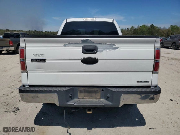 2011 Ford F-150 XL with VIN 1FTFW1CFXBKD24031, listed as a Copart auction lot 50452035 with 197,996 mi miles and Salvage Title. Bid and sale history available at carsss.com. Image 6.