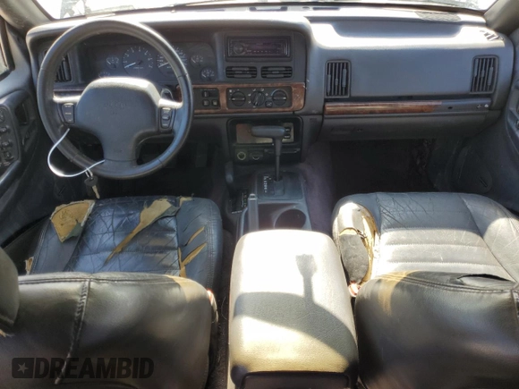 1996 Jeep Grand Cherokee Laredo with VIN 1J4GZ58S1TC340018, listed as a Copart auction lot 86571454 with 0 mi miles and Salvage Title. Bid and sale history available at carsss.com. Image 8.