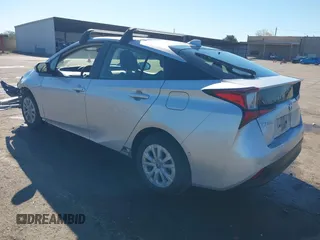 2021 Toyota Prius L Eco with VIN JTDKAMFU5M3130478, listed as a IAAI auction lot 41867606 with 52,223 mi miles. Bid and sale history available at carsss.com. Image 3.